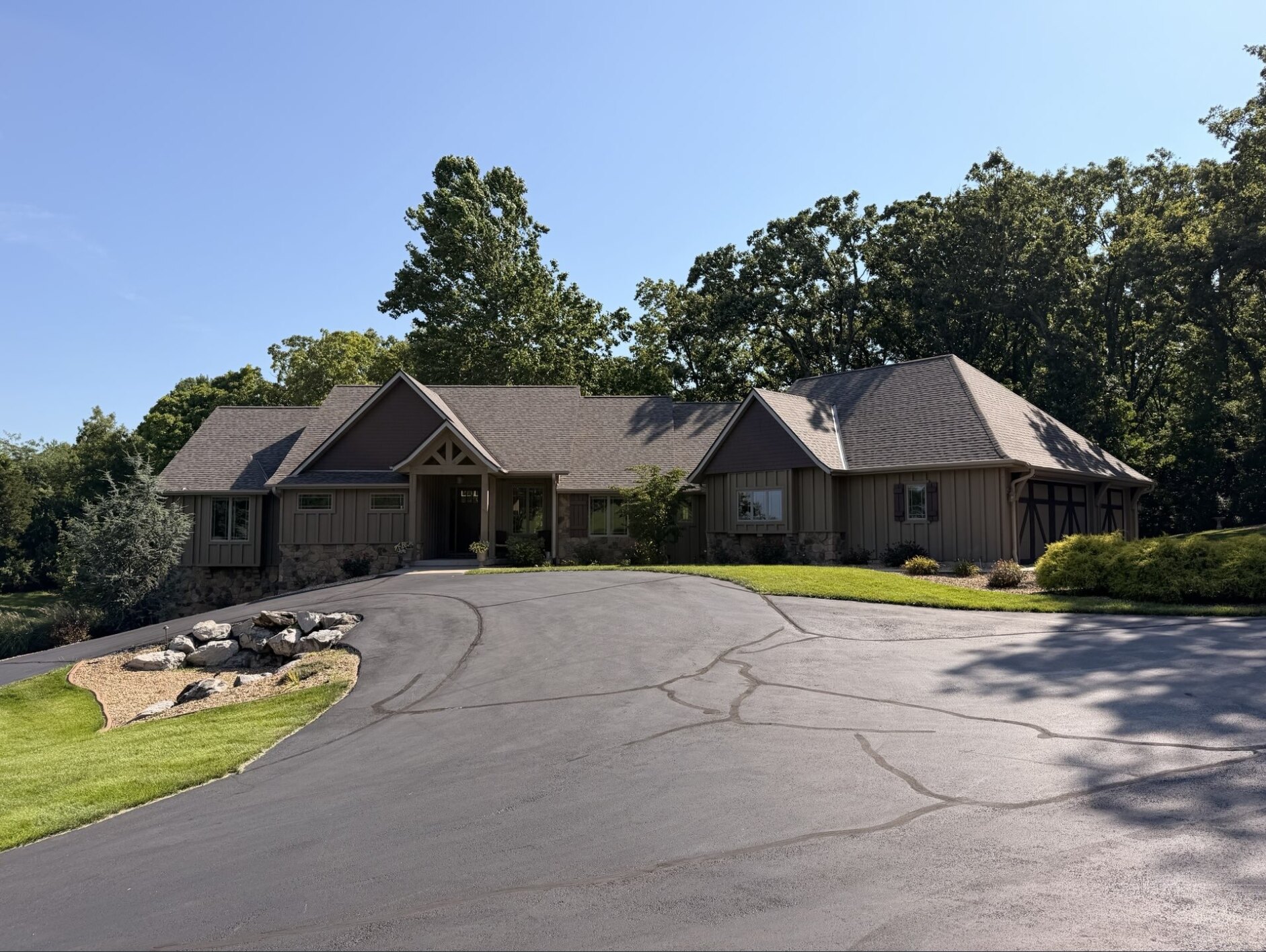 Completed residential roof project on a custom home by Ohm Restoration